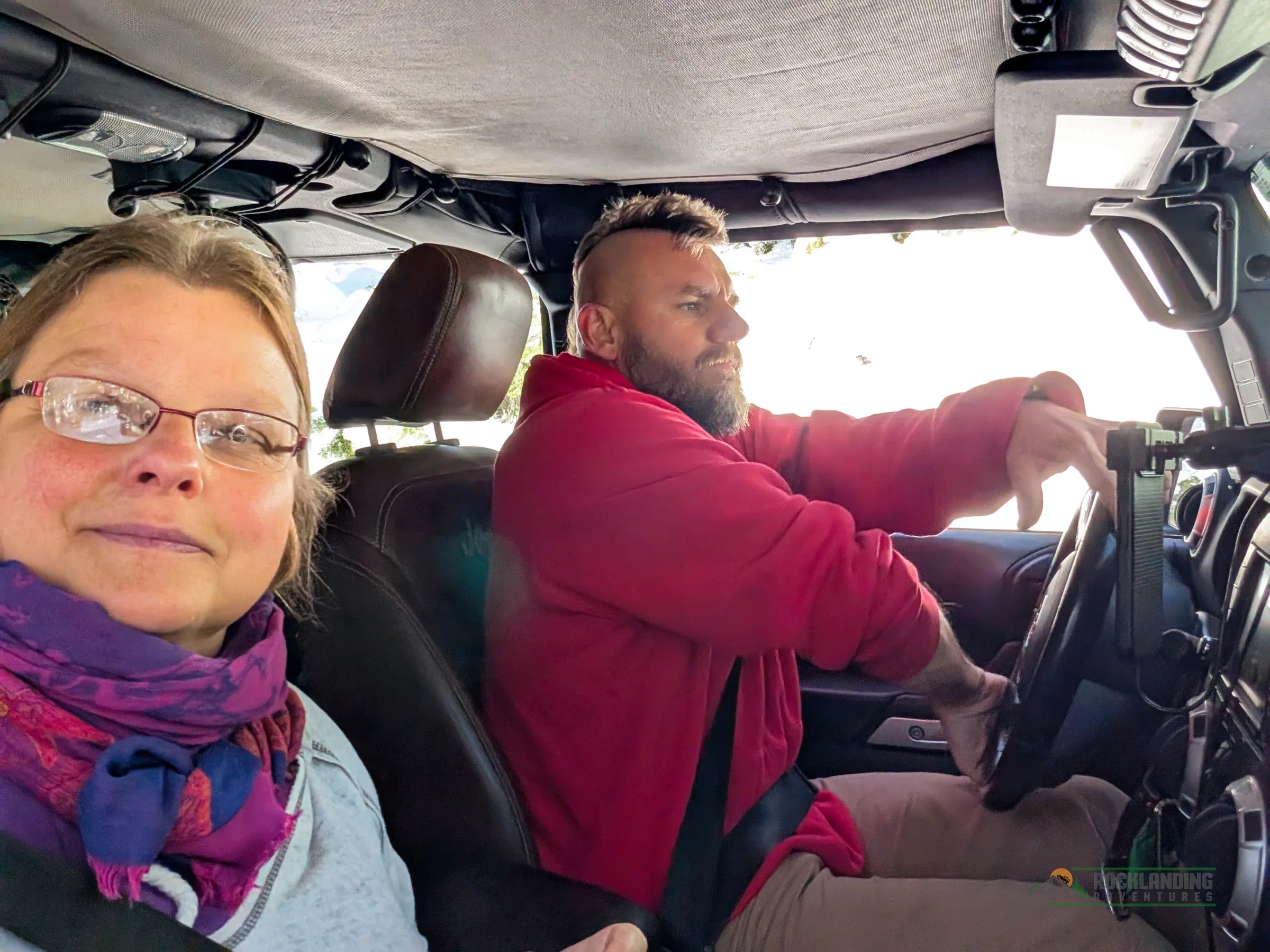 Selfie during driving action, trying to avoid obstacles