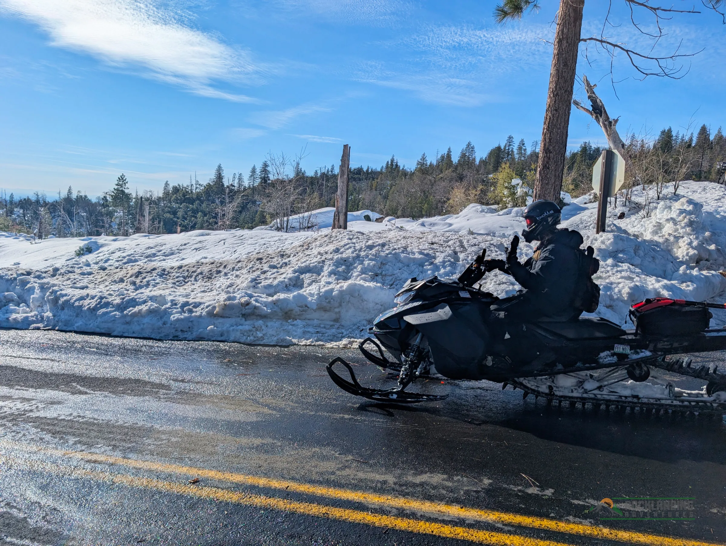 Snowmobile driving on a pavement